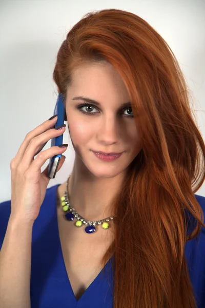 Red hair woman with mobile phone — Stock Photo, Image