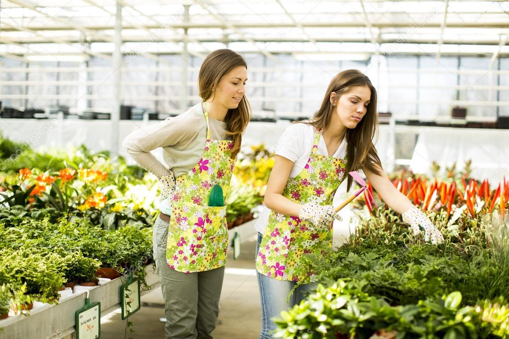 Young women in flower garden