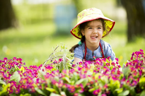 Little girl in the garden Royalty Free Stock Images