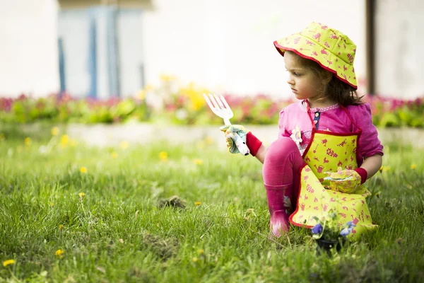 Little girl in the garden — Stock Photo, Image