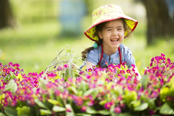 Little girl in the garden Stock Image