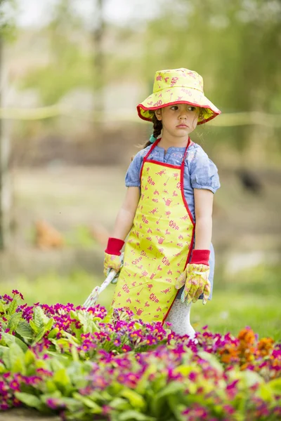 Little girl in the garden — Stock Photo, Image