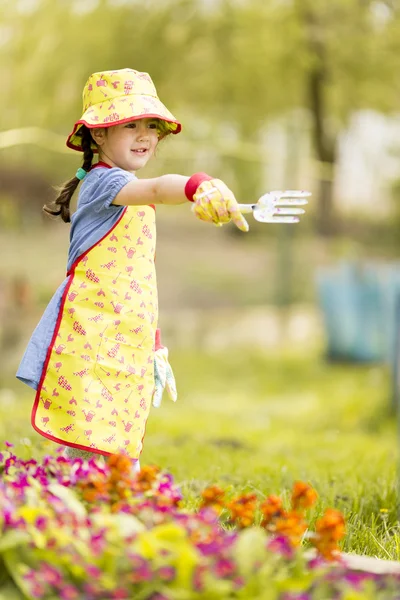 Little girl in the garden — Stock Photo, Image