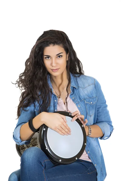 Young woman playing drum — Stock Photo, Image