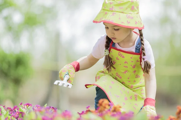 Little girl in the garden Stock Image