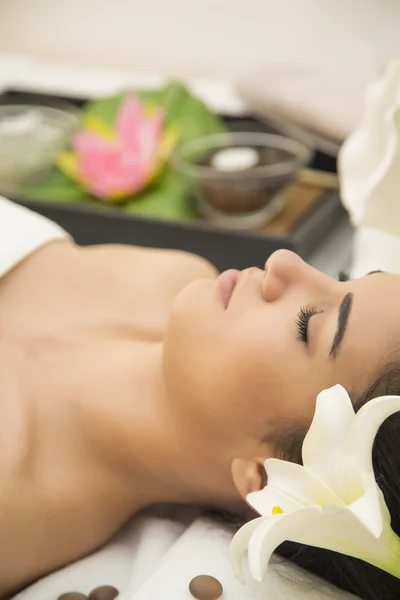 Pretty young woman having a massage — Stock Photo, Image