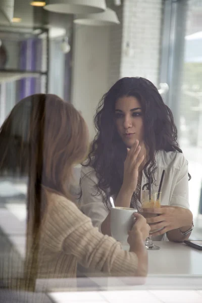 Young women in the cafe — Stock Photo, Image