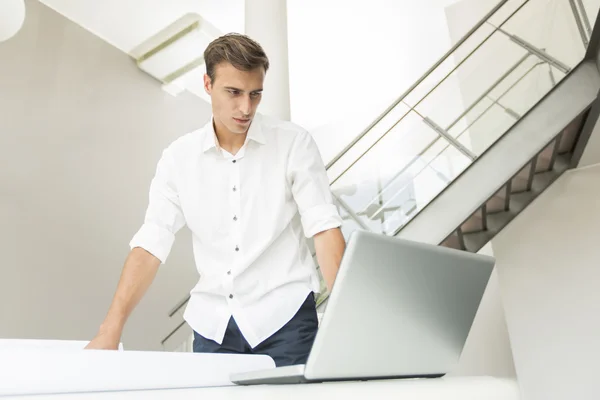 Young man in the office — Stock Photo, Image