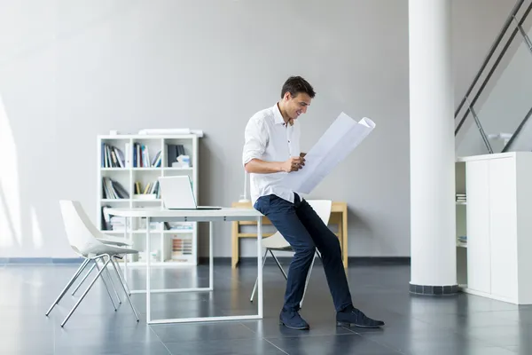 Young man in the office — Stock Photo, Image