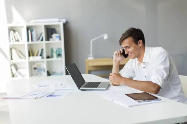 Young man in the office — Stock Photo, Image