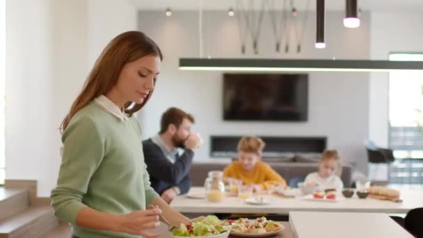 Young Mother Preparing Breakfast Her Family Modern Kitchen — Stock Video