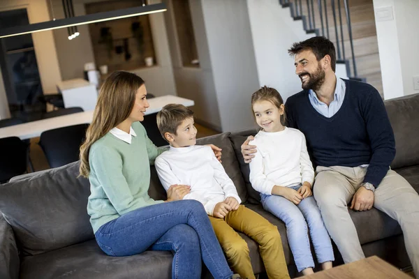 Smiling Young Family Watching Together Sofa Living Room — Stock Photo, Image