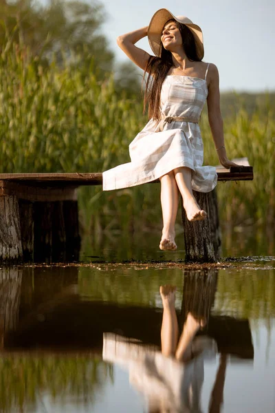 Young Woman Relaxing Wooden Pier Calm Lake Hot Summer Day — Stockfoto
