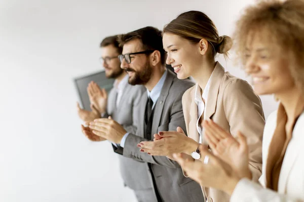 Group Diverse Young Coworkers Standing Row Applauding Office — Fotografia de Stock