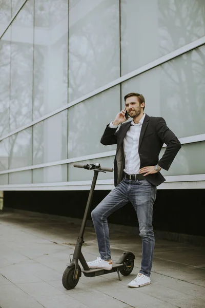 Handsome Young Businessman Using Mobile Phone Electric Scooter — Stock Photo, Image