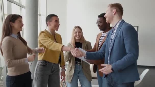 Memembers Young Creative Team Shaking Hands While Working Modern Office — Stock Video