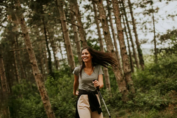 Pretty Young Woman Taking Walk Trekking Poles Forest Carrying Backpack — Stock Photo, Image