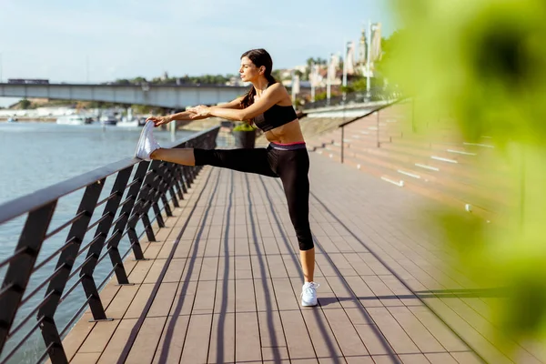 Pretty Young Woman Sportswear Stretching River Promenade — 图库照片