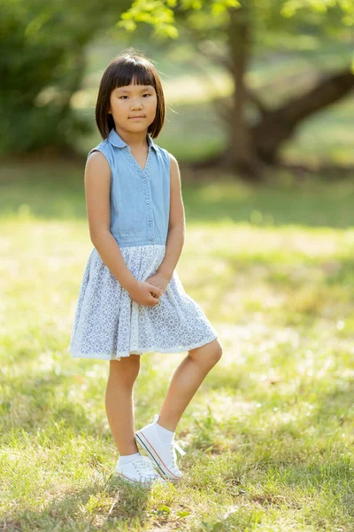 Cute Little Korean Girl Standing Park Sunny Day — Stockfoto