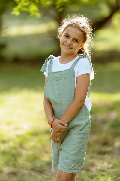 Cute Little Girl Standing Park Sunny Day — Stock Photo, Image