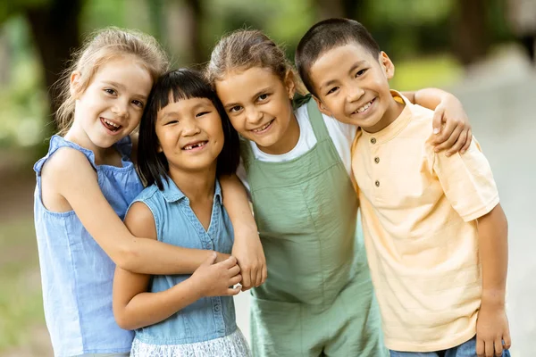 Group Cute Asian Caucasian Kids Having Fun Park — kuvapankkivalokuva