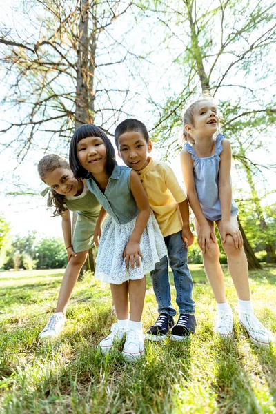 Group Cute Asian Caucasian Kids Having Fun Park — Zdjęcie stockowe