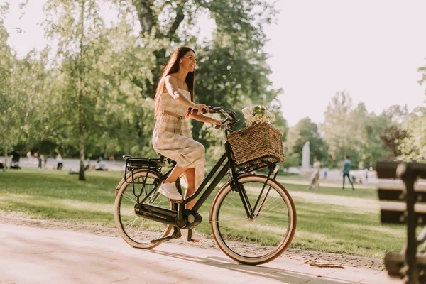 Pretty Young Woman Riding Electric Bike Flowers Basket — Foto Stock