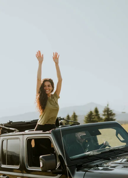 Pretty Young Woman Enjoying Freedom Terrain Vehicle Sunny Day — Φωτογραφία Αρχείου