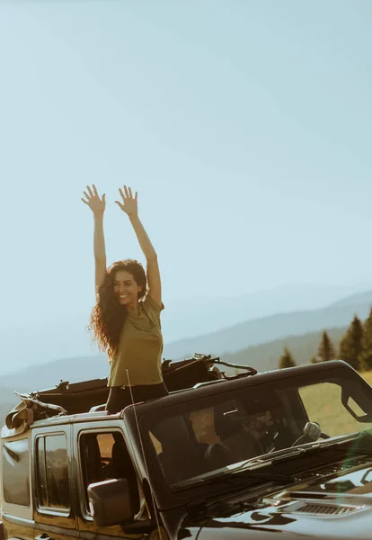 Pretty Young Woman Enjoying Freedom Terrain Vehicle Sunny Day — Φωτογραφία Αρχείου