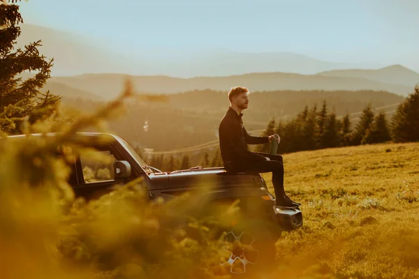 Handsome Young Man Relaxing Terrain Vehicle Hood Countryside — 스톡 사진