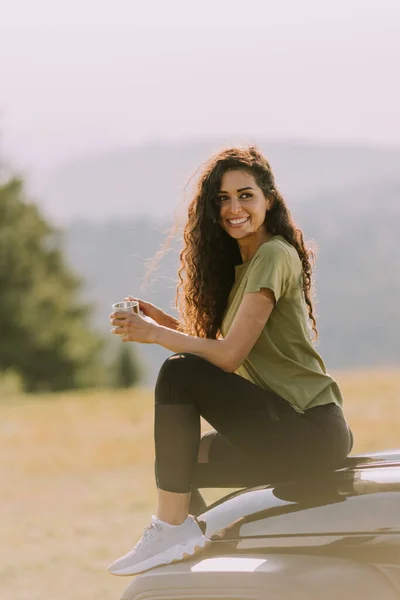 Pretty Young Woman Relaxing Terrain Vehicle Hood Countryside — Stockfoto