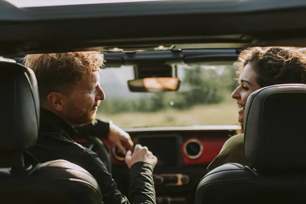 stock image Young handsome couple having fun on roadtrip