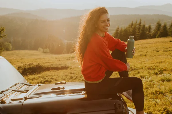Pretty Young Woman Relaxing Terrain Vehicle Hood Countryside — Fotografia de Stock