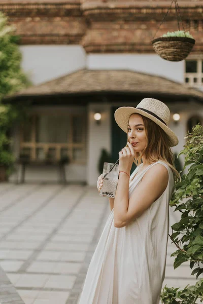 Pretty Young Woman Hat Drinking Cold Lemonade Resort Garden — ストック写真
