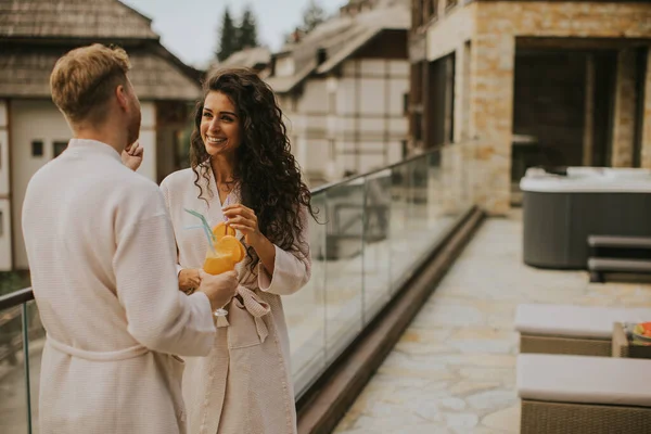 Handsome Young Relaxing Outdoor Terrace Drinking Fresh Orange Juice — Foto Stock