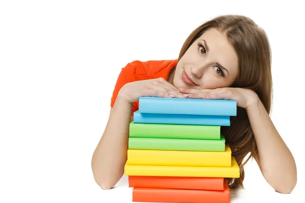 Woman lying on the stack of books — Stock Photo, Image
