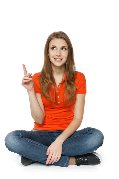 Female sitting with crossed legs on the floor — Stock Photo, Image