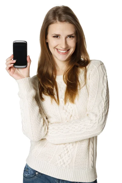 Frau zeigt ihr Handy — Stockfoto