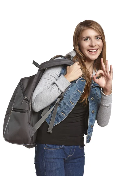 Girl hiker with backpackshowing OK gesture — Stock Photo, Image