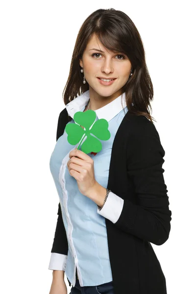 Woman holding shamrock leaf — Stock Photo, Image