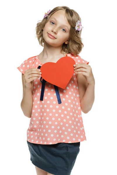 Little girl holding heart shape — Stock Photo, Image