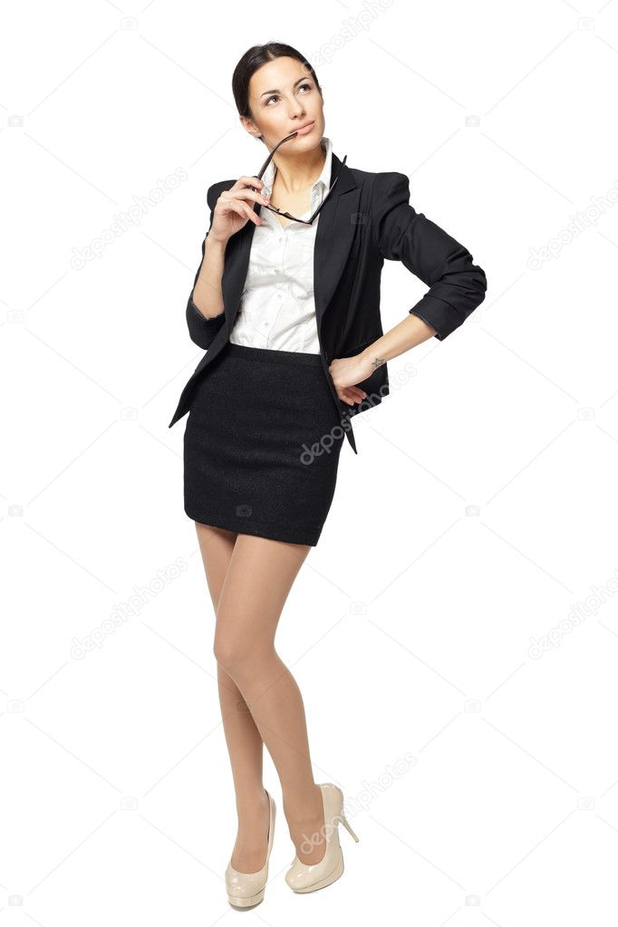 Business woman looking upwards Stock Photo by