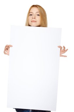 Girl holding peeking out the adge of blank banner clipart