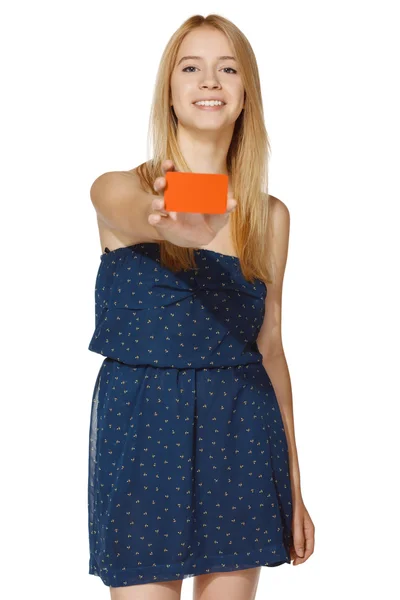 Young smiling female holding blank credit card — Stock Photo, Image