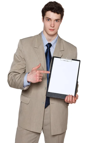 Serious businessman holding blank whiteboard — Stock Photo, Image