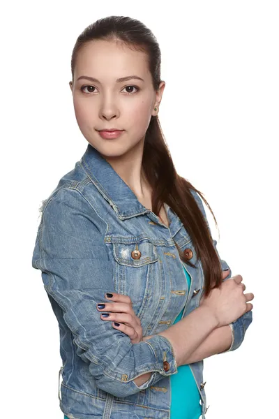 Casual denim teen flicka med knäppta händer — Stockfoto