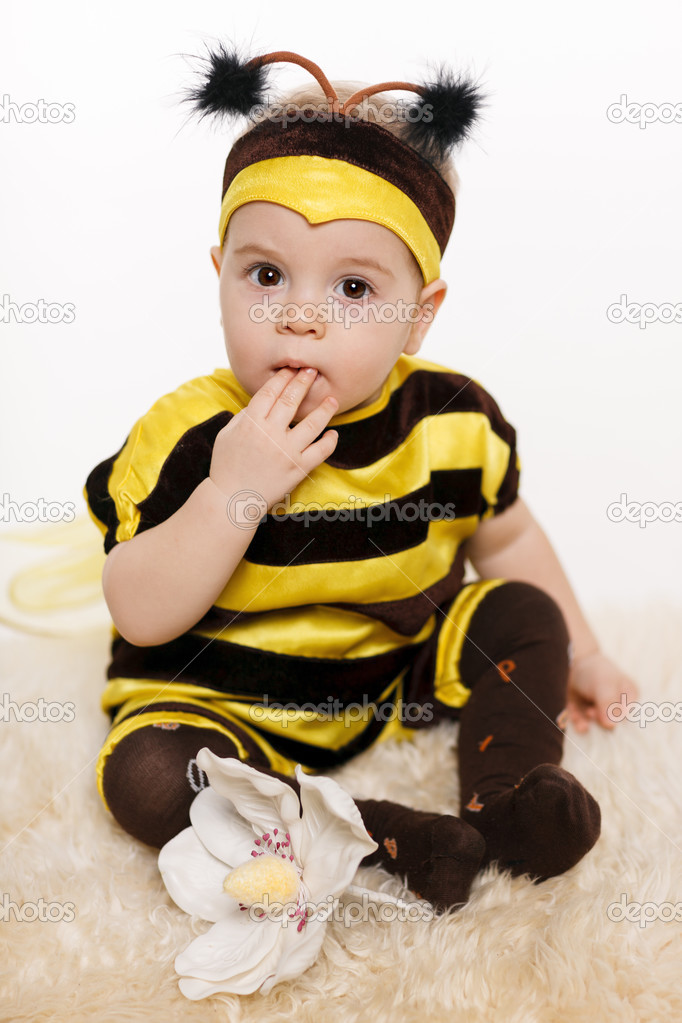 Baby wearing bee costume sitting on the floor — Stock Photo © pavel