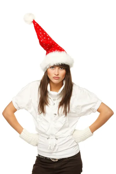 生气的女孩，圣诞老人的帽子 — 图库照片