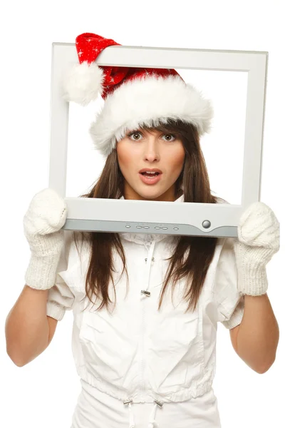 Girl in Santa hat broadcasting Christmas news through TV or computer screen — Stock Photo, Image