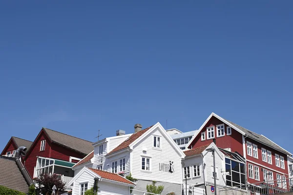 Typical norwegian red and white wooden houses with roof background, Haugesund — Stock Photo, Image